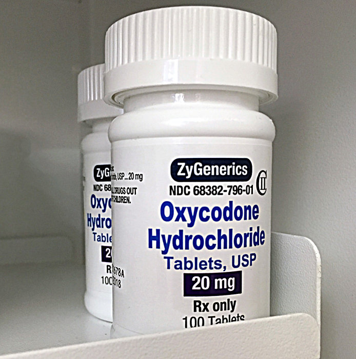 Ogden Utah: July 16, 2016: Oxycodone bottle on pharmacy shelf